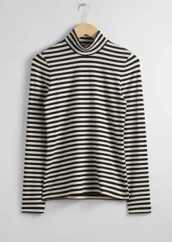Topp Med Turtleneck